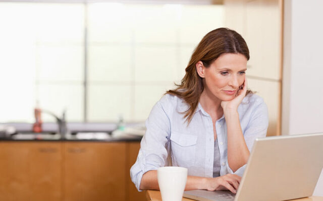 Women exploring surgery options on a laptop