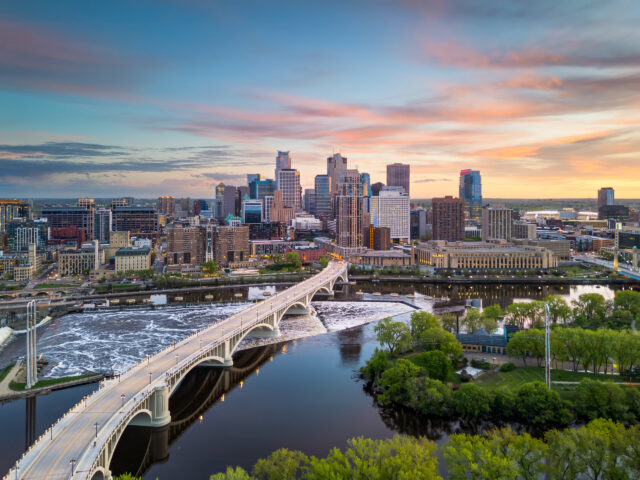 Minneapolis Minnesota skyline over stone arch bridge