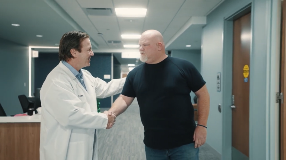 Patient discussing shoulder recovery after treatment with Dr. Michael Q. Freehill